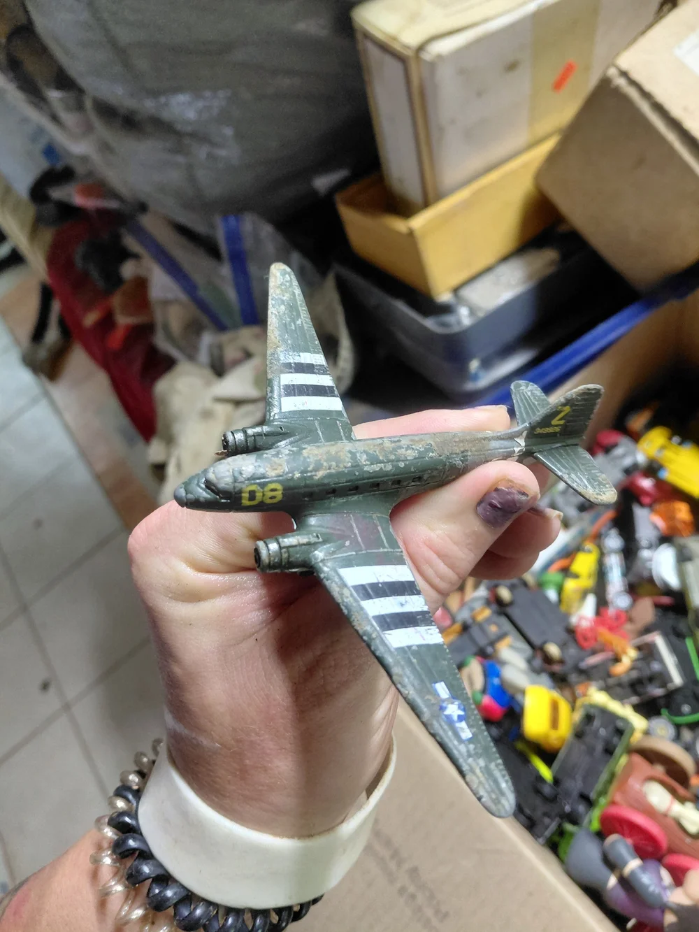 vintage-style diecast model of a World War II Douglas C-47 Skytrain (or Dakota)